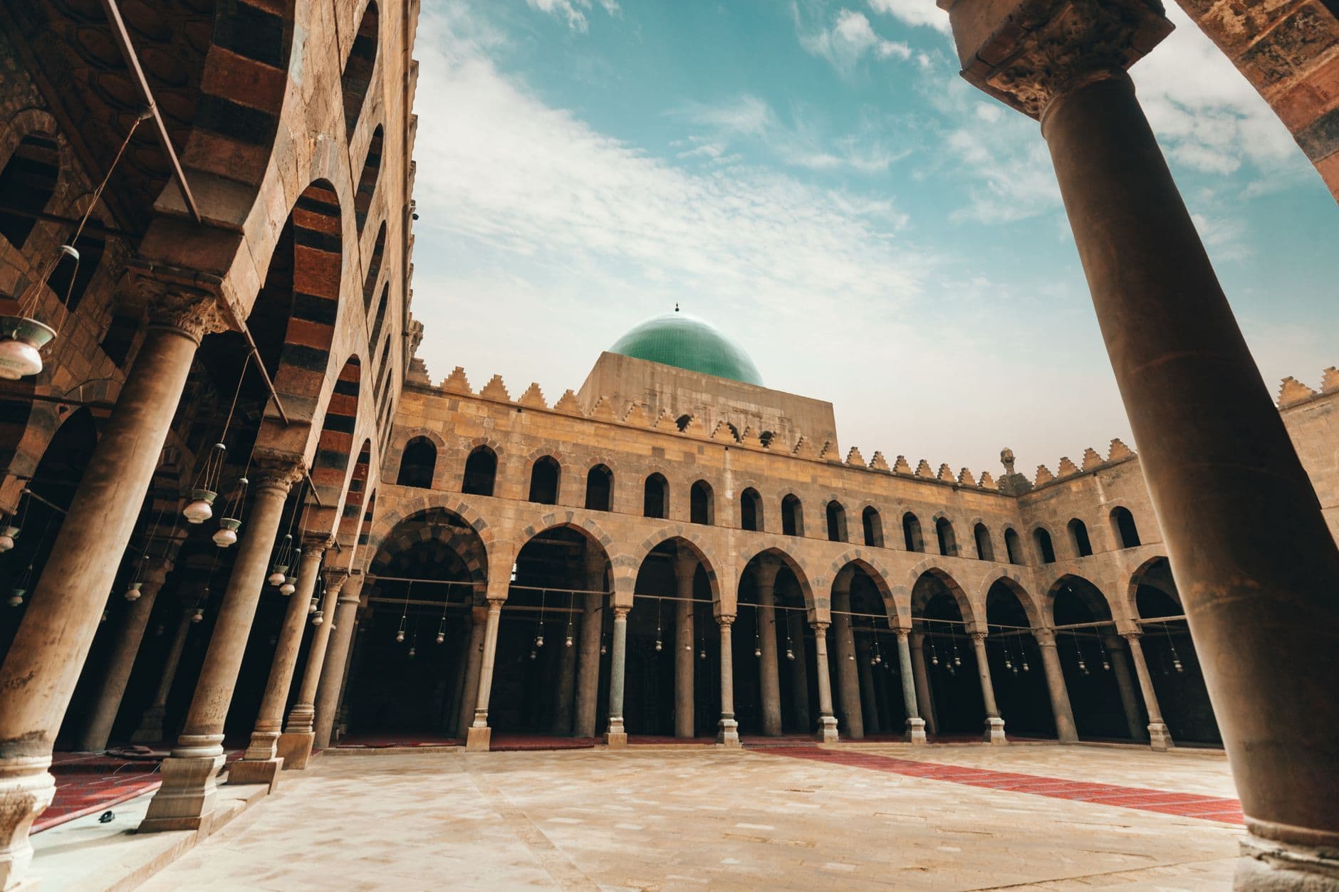 Low angle of old medieval Islamic era fortification Citadel of Cairo with high columns and dome