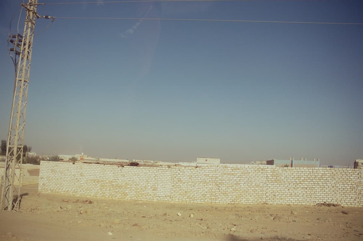 Concrete wall and utility pole in bawiti, egypt