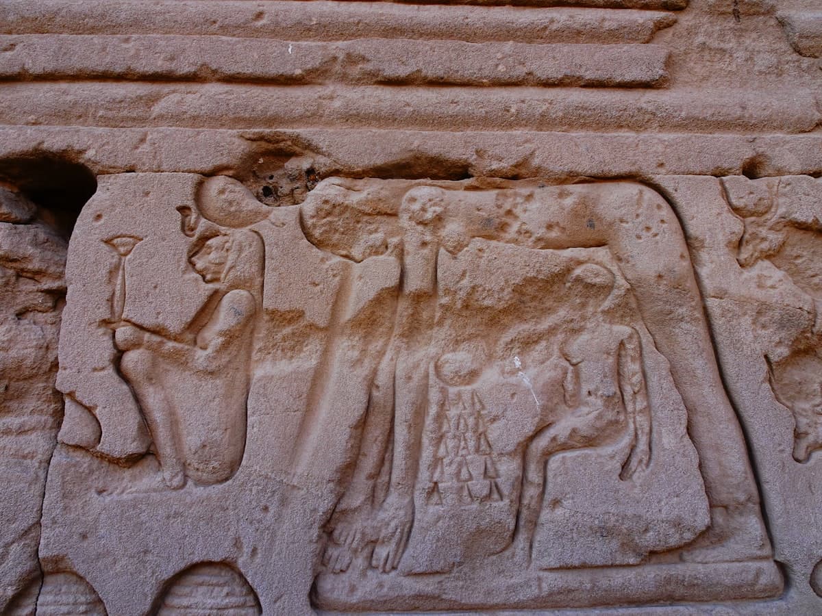 a carving of a man and a woman