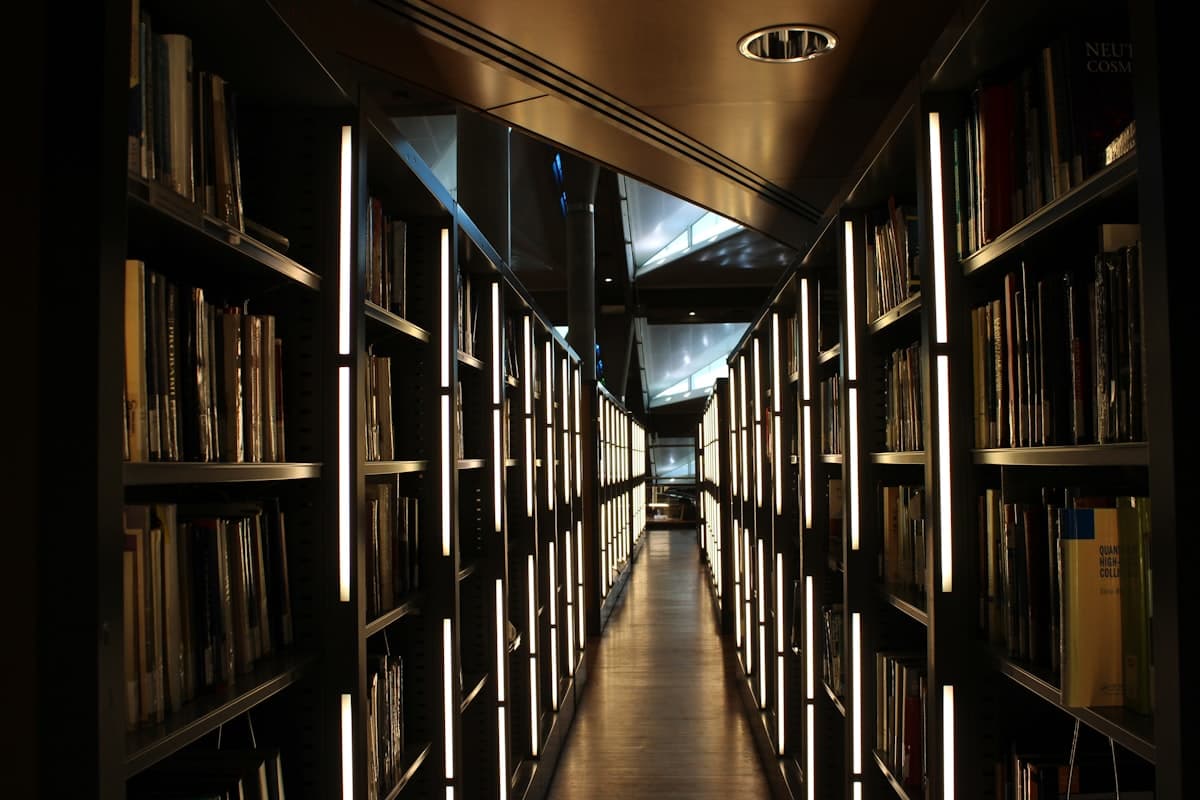 a long row of bookshelves filled with lots of books
