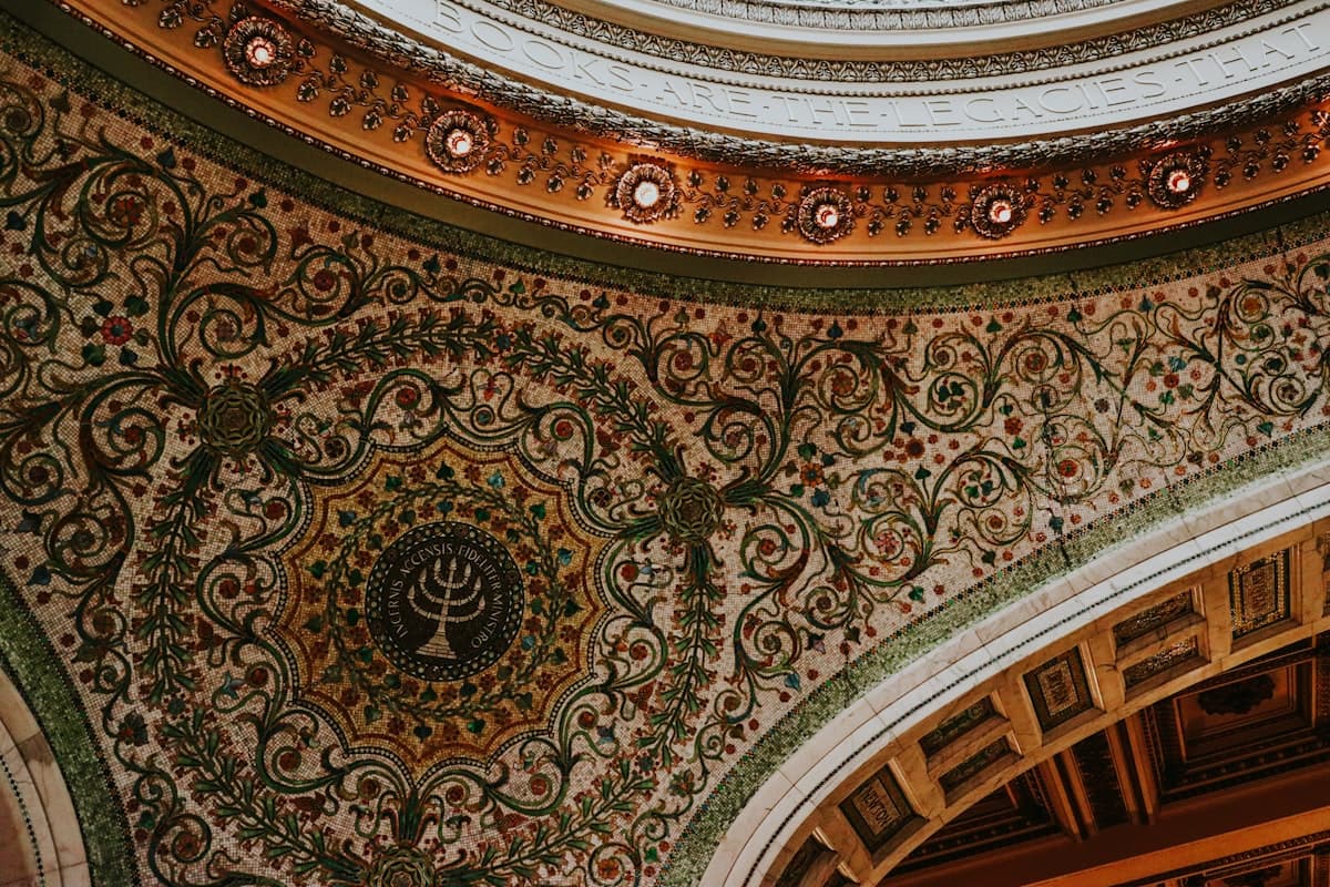 Ornate, decorative ceiling featuring a menorah.
