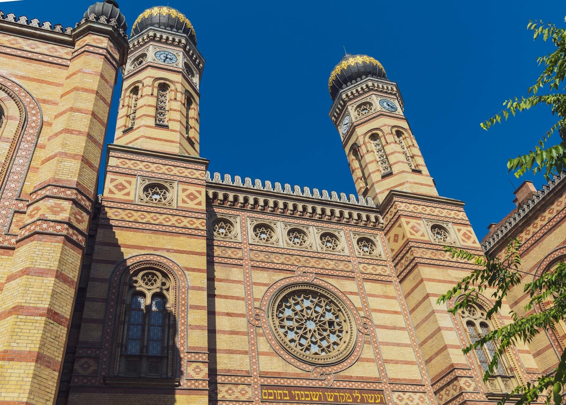 Beautiful low-angle view of Dohany Street Synagogue's ornate architecture in Budapest, Hungary.