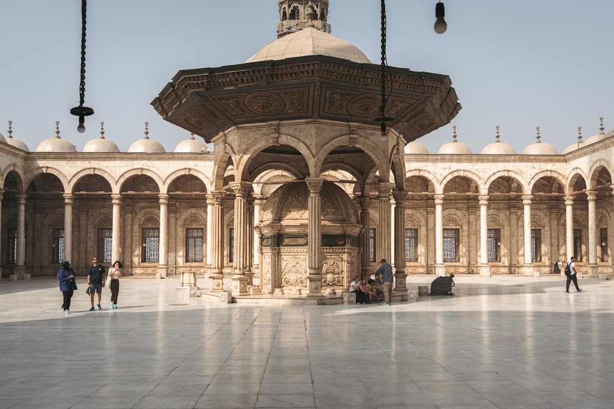 Courtyard of a historic mosque with an ornate fountain
