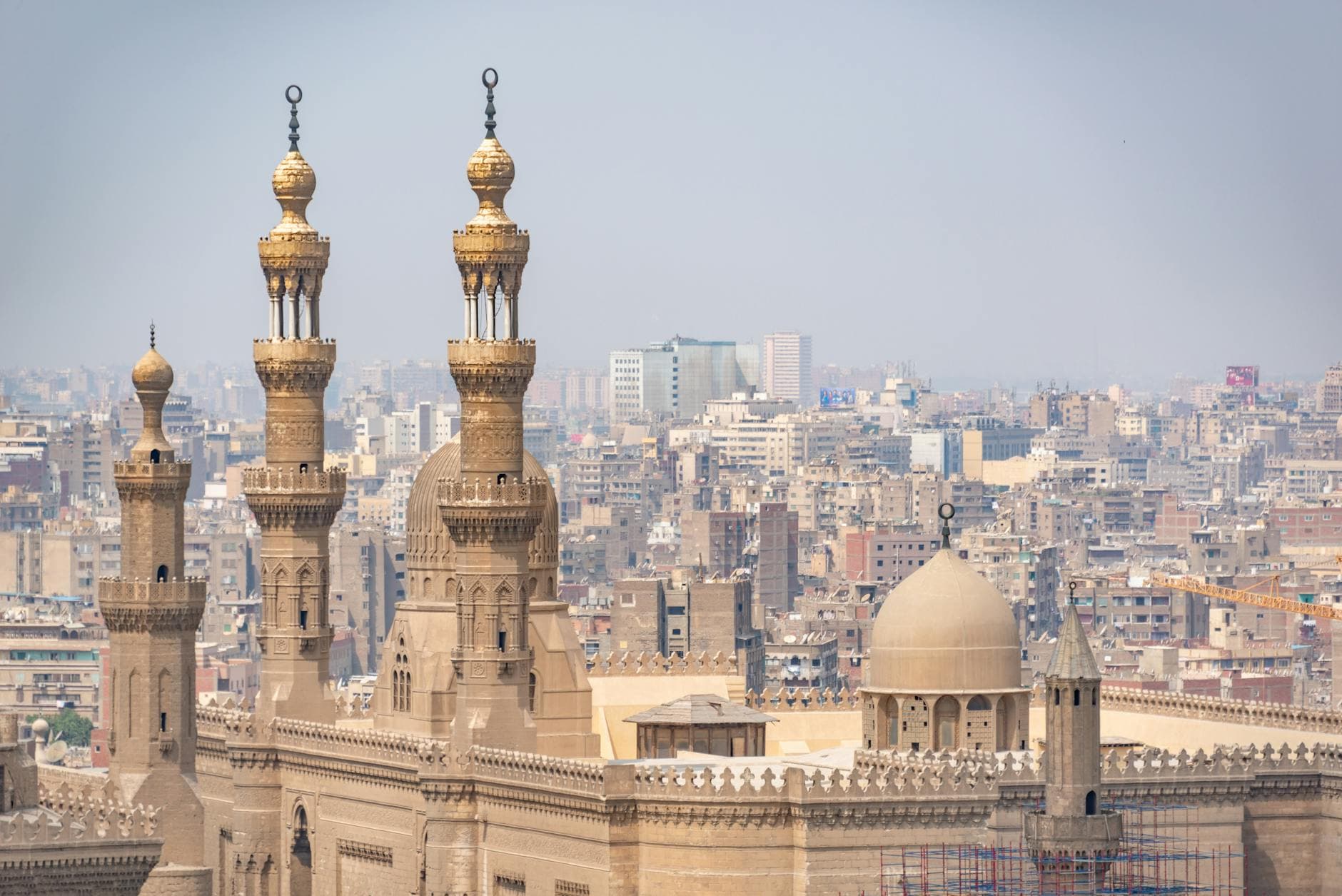 Scenic aerial shot of intricate Islamic architecture with cityscape in Cairo, Egypt.
