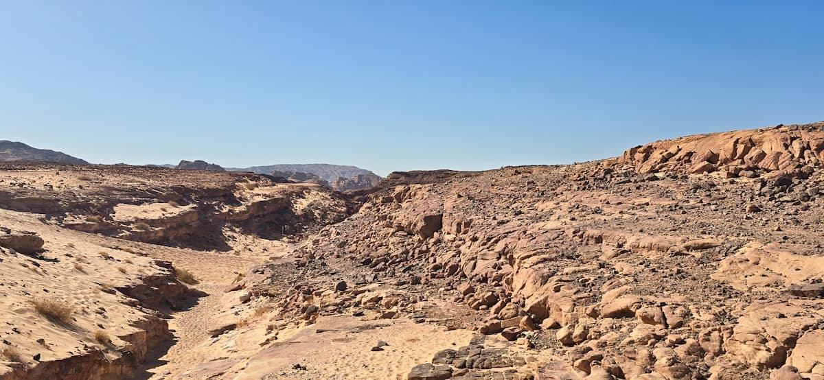 Desert landscape under a blue sky.