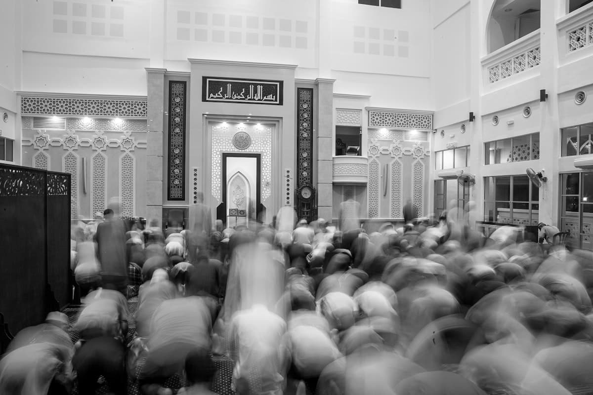 grayscale photography of person inside room