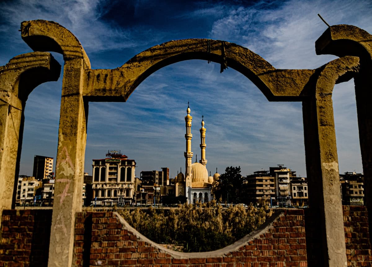 a view of a city through an archway
