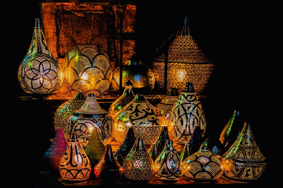 a bunch of vases that are sitting on a table