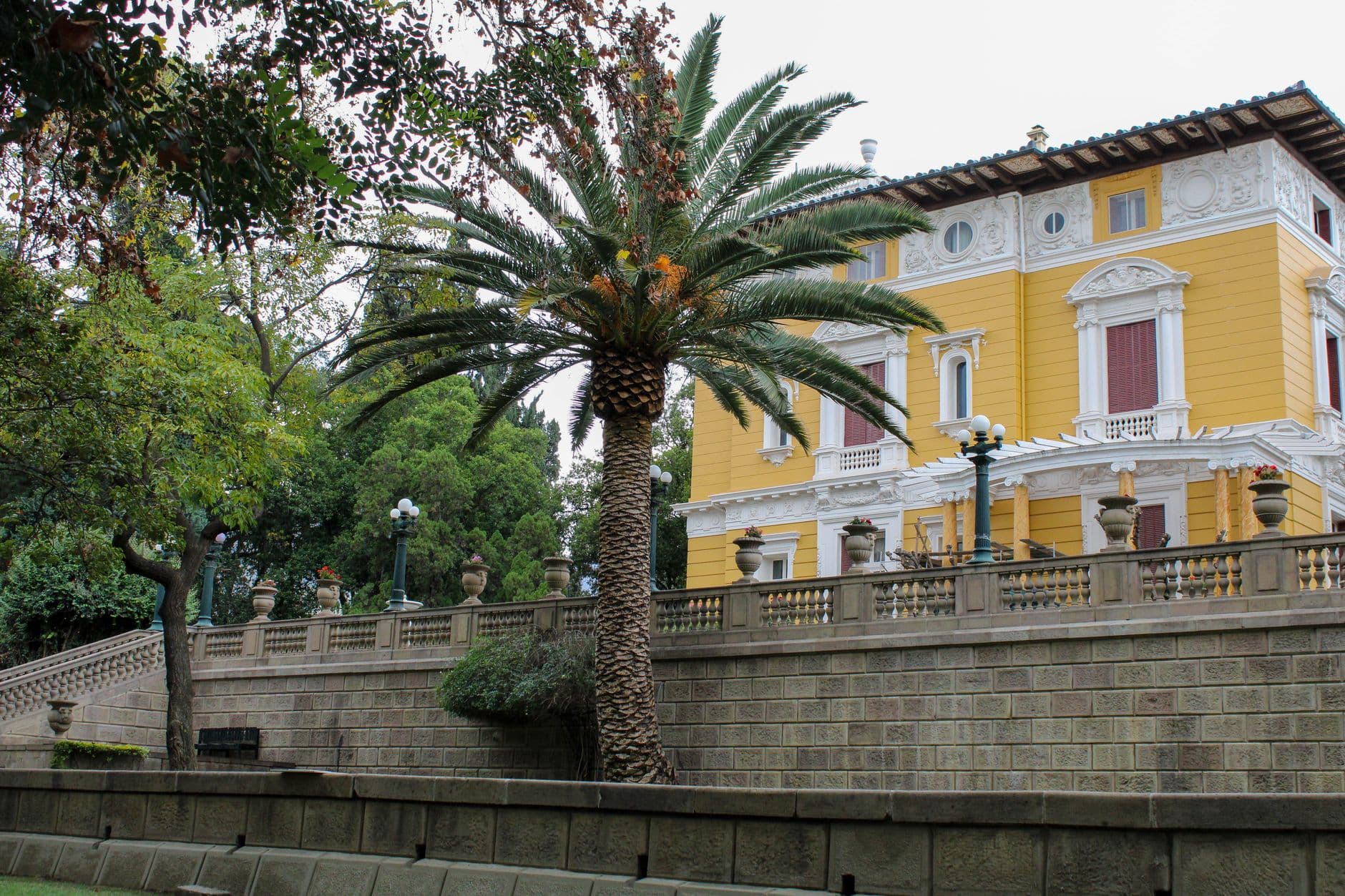 Charming colonial architecture with palm trees in Cochabamba, Bolivia.