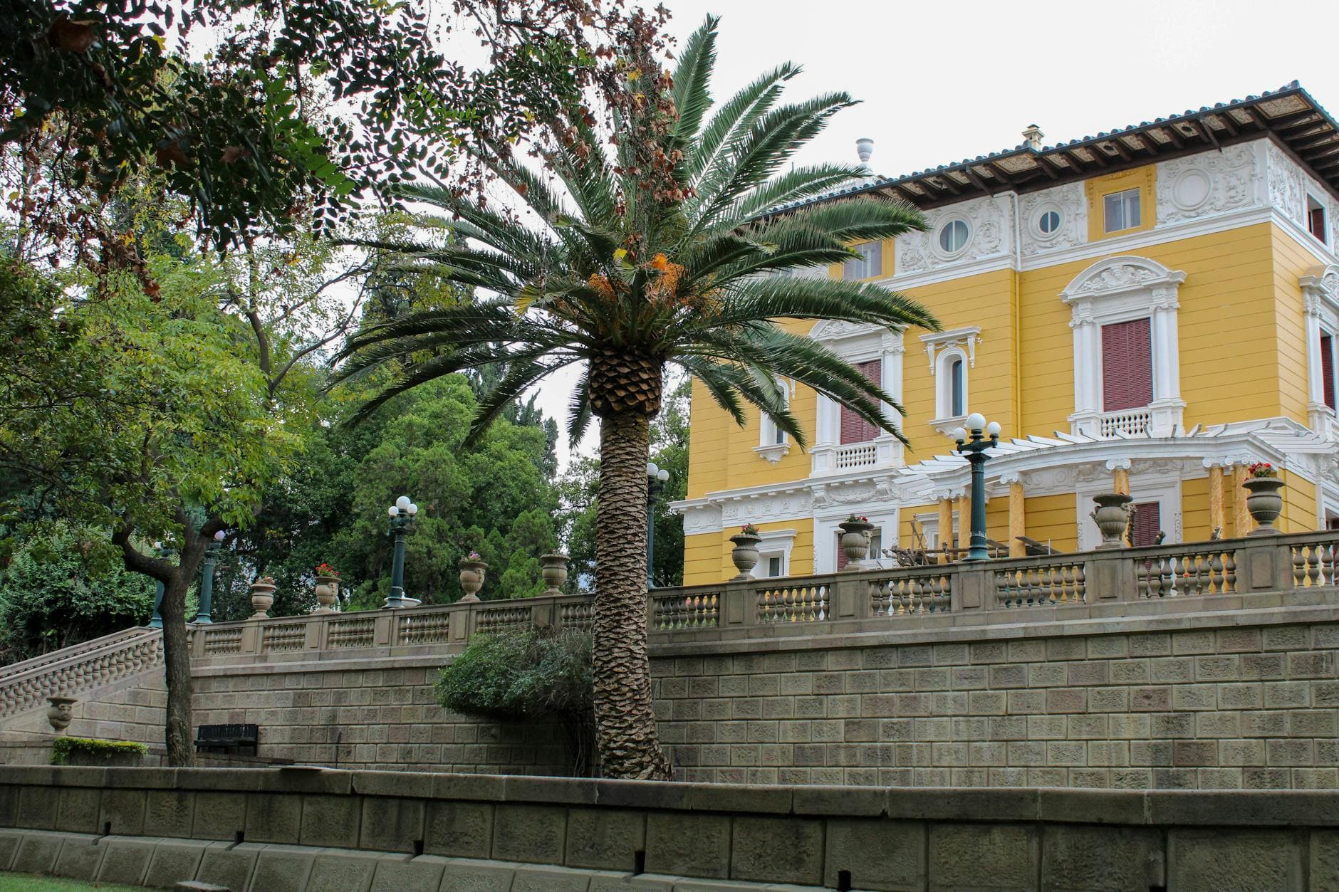 Charming colonial architecture with palm trees in Cochabamba, Bolivia.