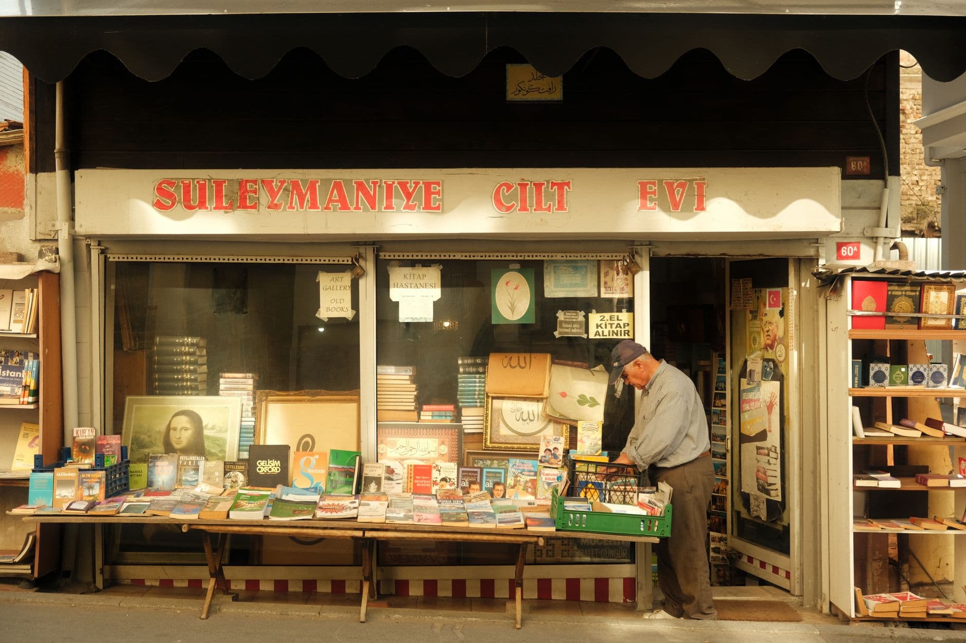 Explore the quaint Suleymaniye bookshop in İstanbul, Türkiye, showcasing a collection of books and local charm.