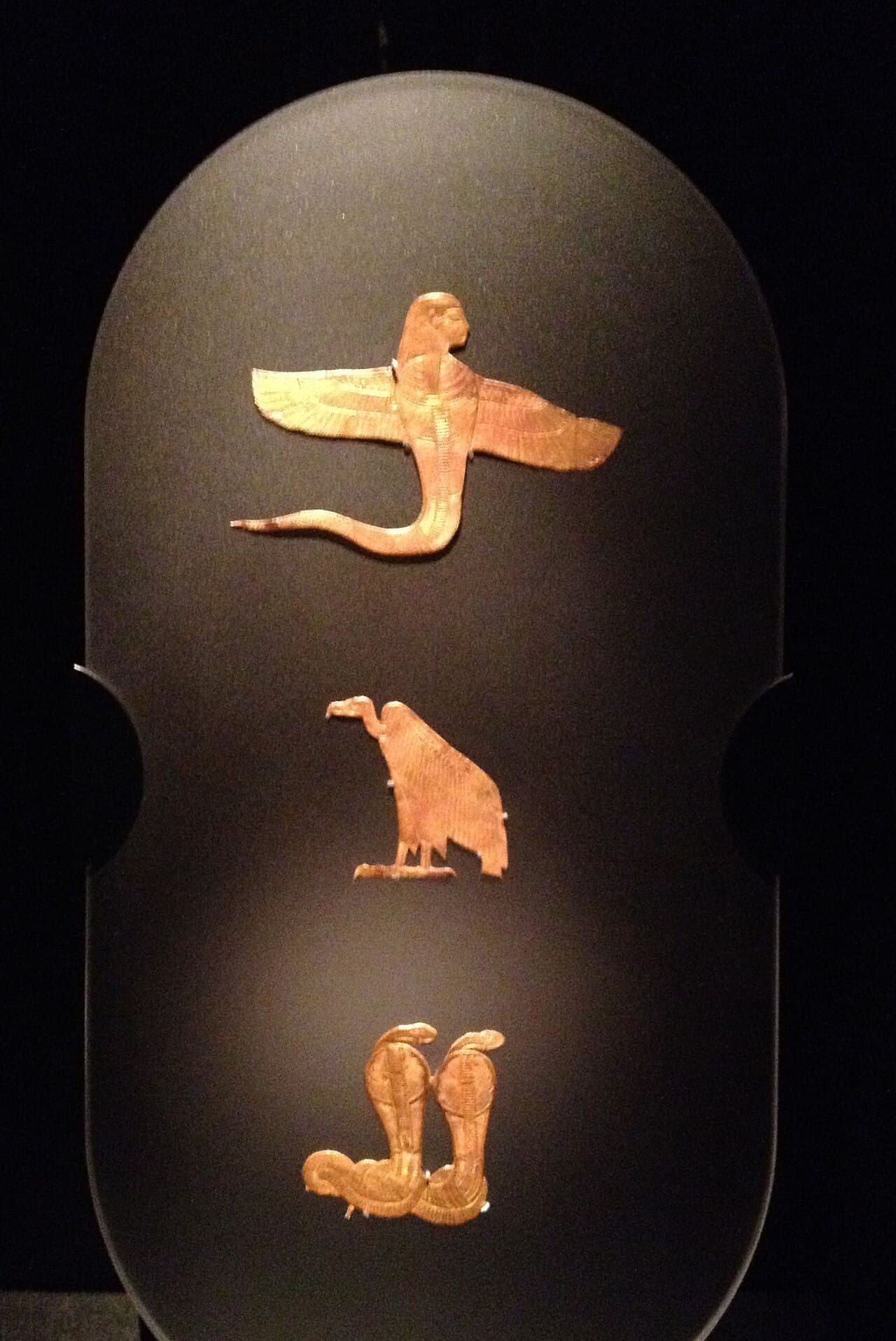 These are genuine amulets found within king Tutankhamun’s burial chamber in his KV62 tomb. They are now part of the perm